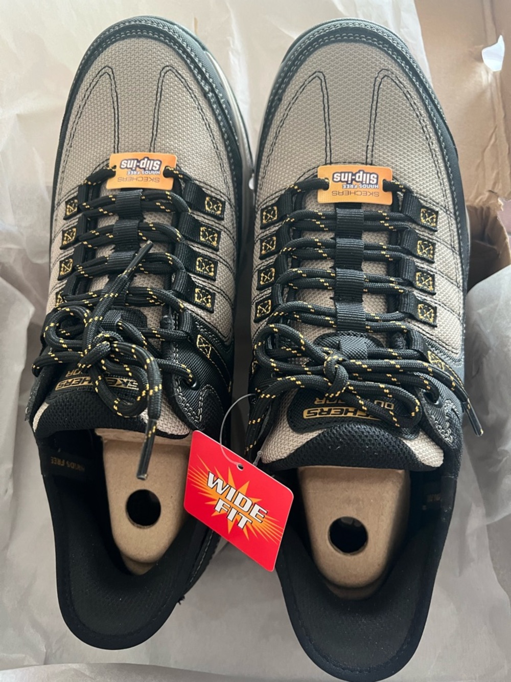 Size 10 Skechers Men's Gray and Black Athletic Lace-Up Shoes with Yellow Accents